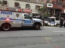 NYPD ESU on scene, and onlookers at the construction site